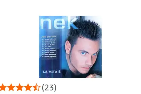 Copertina di "La Vita È" di Nek, con il cantante in primo piano e la lista delle date del suo tour. Le canzoni di Nek sono un successo.