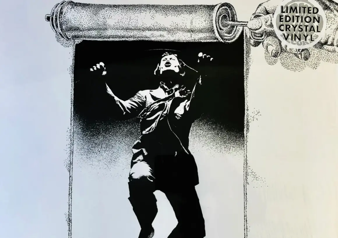 Black and white illustration of a person unrolling a scroll, with "Limited Edition Crystal Vinyl Records" text.